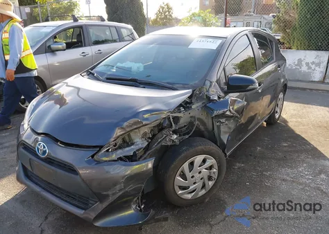 2015 Toyota Prius C One z USA, uszkodzony, nr VIN JTDKDTB37F1095035